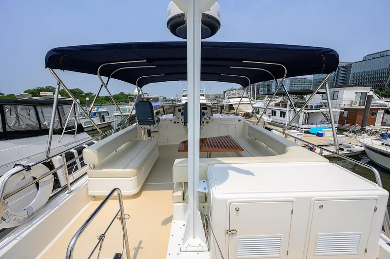 Teal Aweigh Yacht Photos Pics 2011 Grand Banks 41 Europa yacht with spacious deck and seating area.