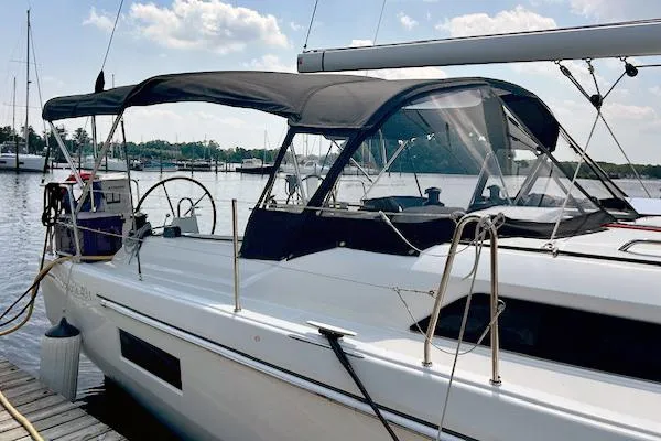  Yacht Photos Pics 2023 Beneteau Oceanis 40.1 sailboat docked, featuring sleek design and spacious cockpit.