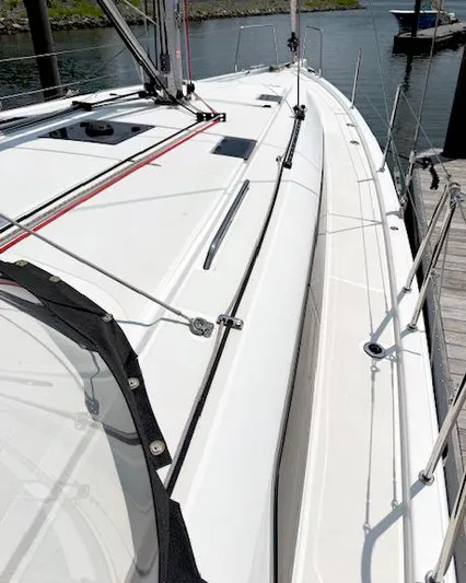  Yacht Photos Pics 2023 Beneteau Oceanis 40.1 sailboat deck view at marina.