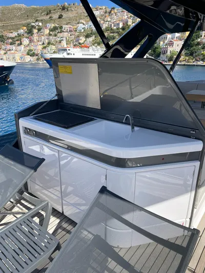 Lf Yacht Photos Pics Outdoor kitchen on 2023 Ferretti Yachts 720, featuring sleek design and waterfront view.