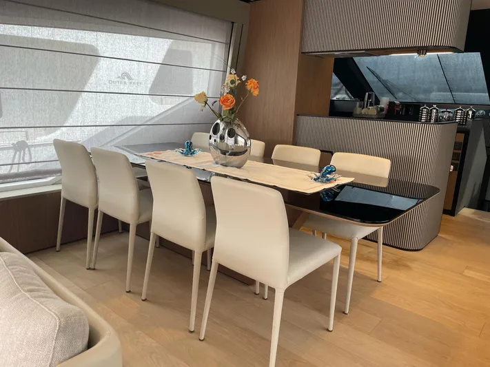 Lf Yacht Photos Pics Luxurious dining area on 2023 Ferretti Yachts 720 with elegant decor and modern furnishings.