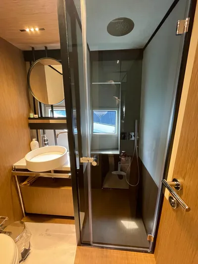 Lf Yacht Photos Pics Luxurious bathroom in 2023 Ferretti Yachts 720, featuring modern fixtures and elegant design.