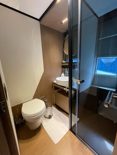 Lf Yacht Photos Pics Luxury bathroom in 2023 Ferretti Yachts 720, featuring modern fixtures and elegant design.