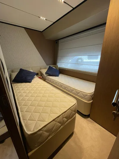 Lf Yacht Photos Pics 2023 Ferretti Yachts 720 cabin with twin beds and modern interior design.