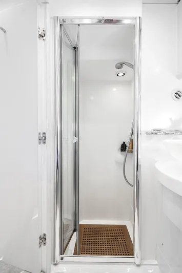  Yacht Photos Pics Shower area in 2005 Sunseeker Predator 68 yacht, featuring sleek design and modern fixtures.