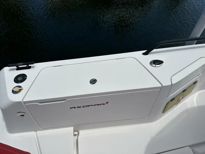  Yacht Photos Pics Axopar 37 XC Cross Cabin Brabus 2021, sleek white deck detail by the water.