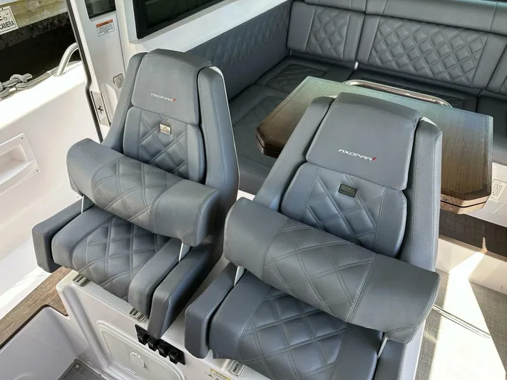  Yacht Photos Pics Luxurious seating in 2021 Axopar 37 XC Cross Cabin Brabus with quilted leather design.