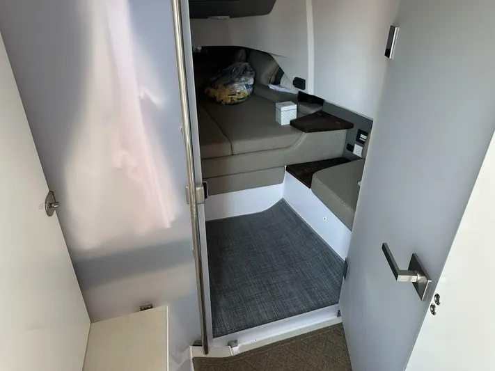  Yacht Photos Pics 2021 Axopar 37 XC Cross Cabin Brabus interior with cozy seating and modern design.