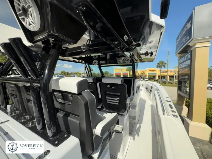 400-102 Yacht Photos Pics 2024 Blackfin 400 boat interior with seating and Sovereign Yachts logo.