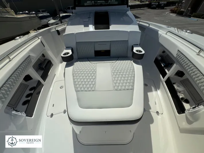 400-102 Yacht Photos Pics 2024 Blackfin 400 boat interior with luxurious seating and storage compartments.