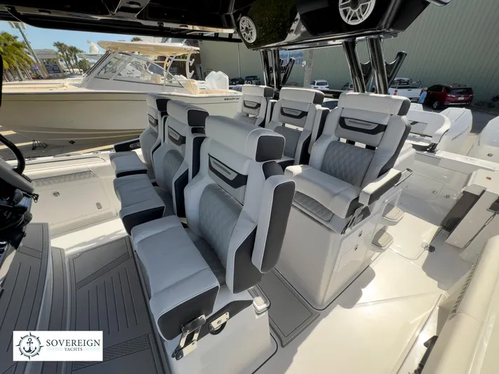 400-102 Yacht Photos Pics 2024 Blackfin 400 boat interior with luxurious seating and modern design.