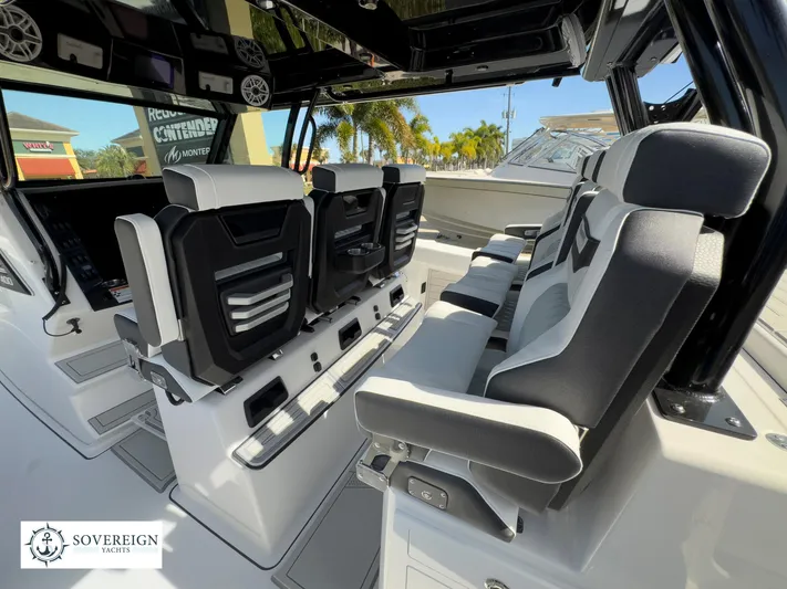 400-102 Yacht Photos Pics 2024 Blackfin 400 boat interior with luxurious seating and modern design.