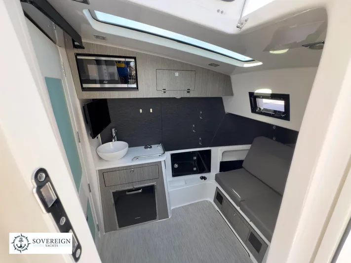 400-102 Yacht Photos Pics Interior cabin of 2024 Blackfin 400 boat with modern amenities and sleek design.