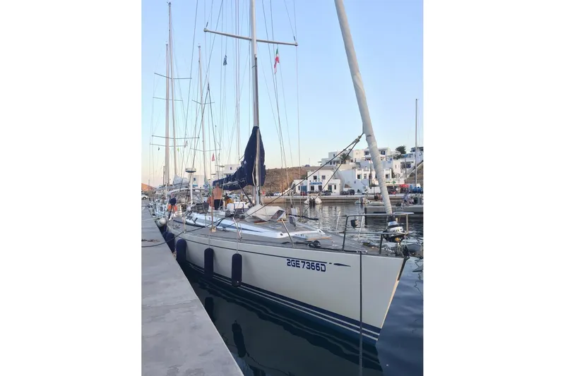 Vanish 2 Yacht Photos Pics Sailing yacht Nautor Swan 56, 1999 model, docked at a marina with clear skies.