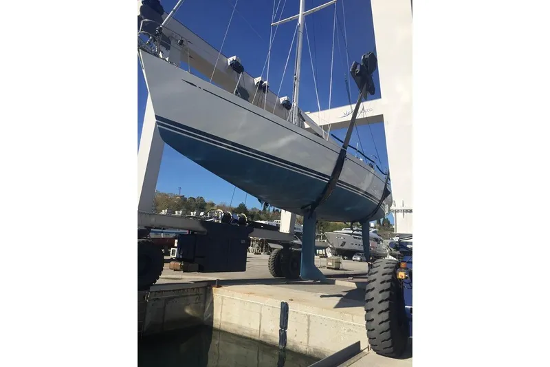 Vanish 2 Yacht Photos Pics Nautor Swan 56 yacht from 1999 being lifted in a boatyard.