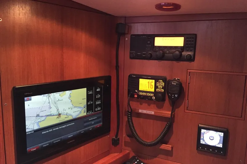 Vanish 2 Yacht Photos Pics Navigation equipment on a 1999 Nautor Swan 56 yacht, featuring GPS and communication devices.