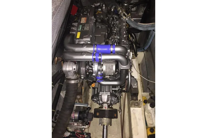 Vanish 2 Yacht Photos Pics Engine of a 1999 Nautor Swan 56 yacht, showcasing intricate mechanical components.