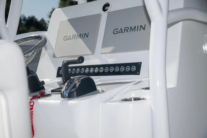  Yacht Photos Pics Control panel of 2025 Contender 26 Bay boat with Garmin displays.
