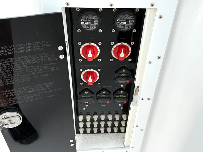  Yacht Photos Pics Electrical panel of 2022 Aquasport 3000CC boat with switches and controls.