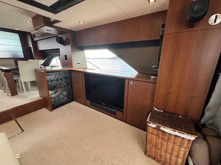 Schatzi Yacht Photos Pics Luxurious interior of 2013 Fairline Squadron 78 Custom yacht with elegant wood finishes.