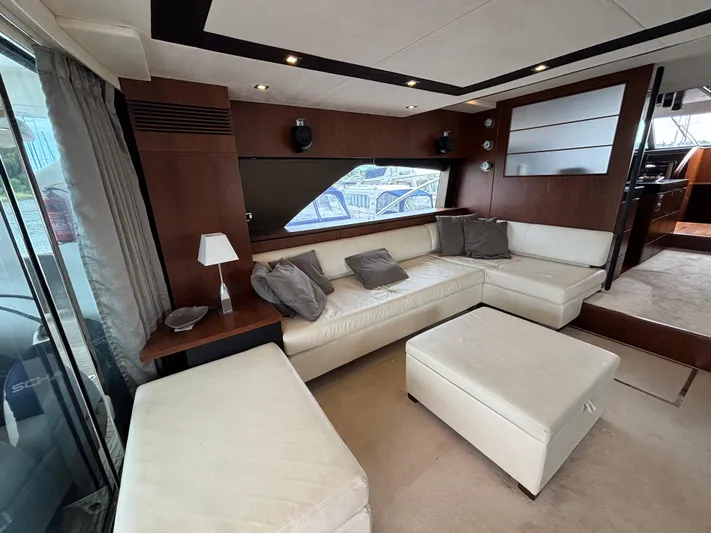 Schatzi Yacht Photos Pics Luxurious interior of 2013 Fairline Squadron 78 Custom yacht with white leather seating.