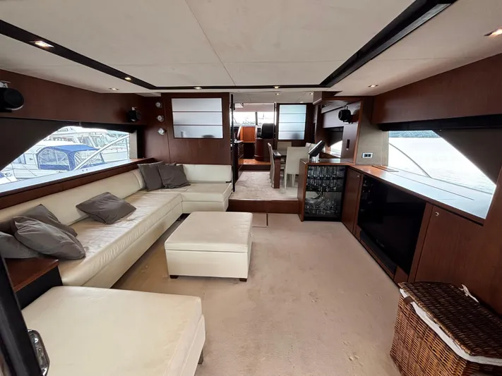 Schatzi Yacht Photos Pics Luxurious interior of 2013 Fairline Squadron 78 Custom yacht with elegant seating and modern design.