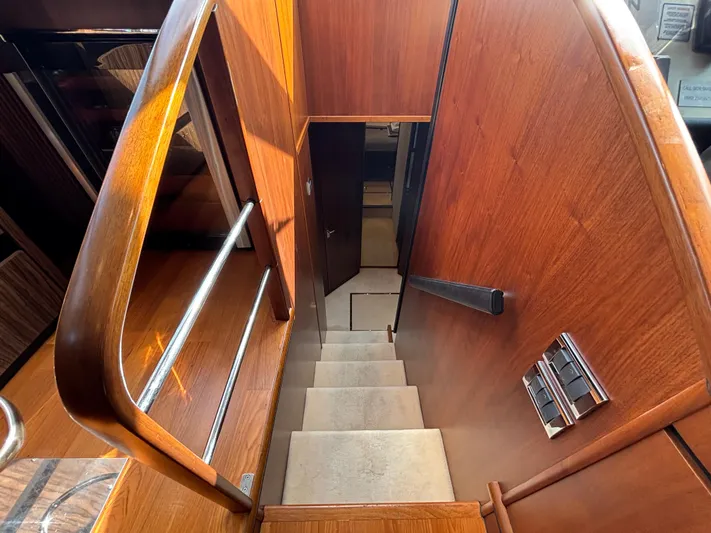 Schatzi Yacht Photos Pics Luxurious wooden staircase on 2013 Fairline Squadron 78 Custom yacht interior.