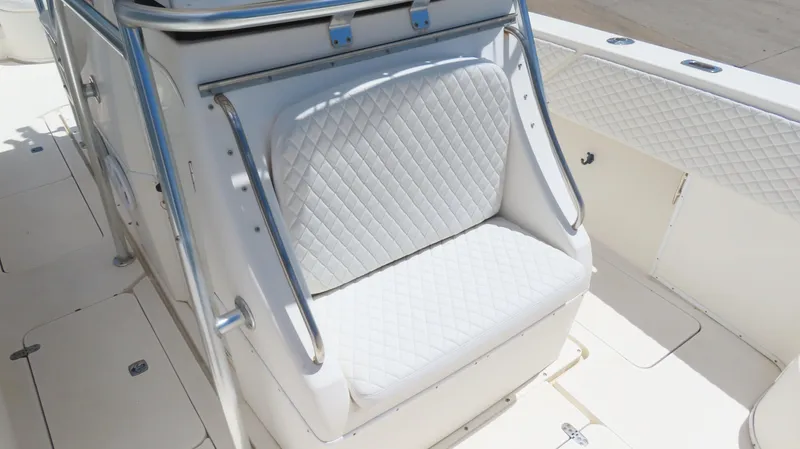  Yacht Photos Pics 2002 Fountain 38 TE boat with white quilted seating and stainless steel railings.