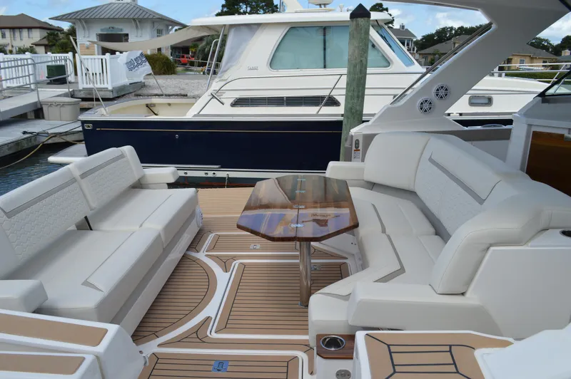 Lisa Marie Yacht Photos Pics Tiara 48 LS - Aft Table and Seating