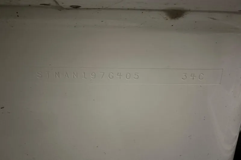  Yacht Photos Pics 2005 Silverton 34 Convertible hull identification number, embossed on white surface.