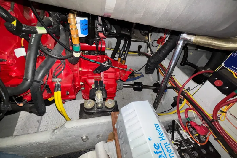  Yacht Photos Pics Engine room of a 2005 Silverton 34 Convertible boat, showcasing mechanical components.