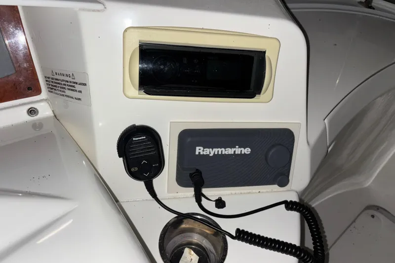  Yacht Photos Pics Control panel of a 2005 Silverton 34 Convertible with Raymarine equipment.