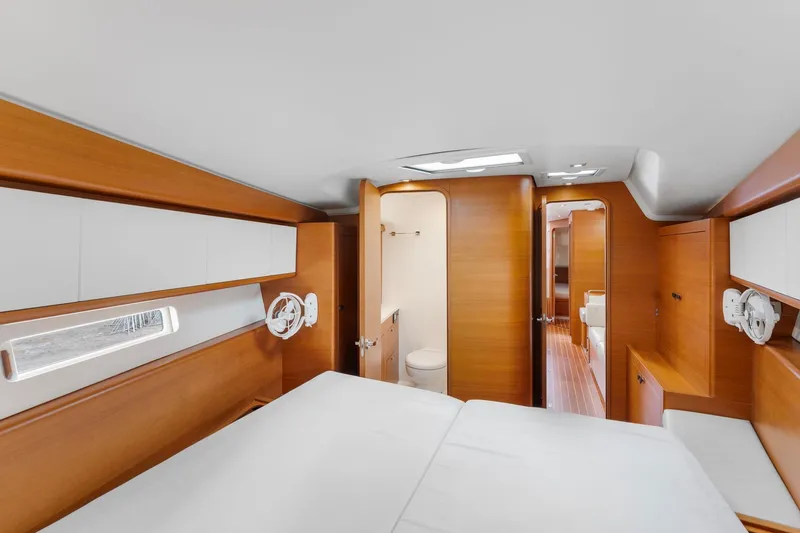 Rusalka Yacht Photos Pics Luxurious interior of 2015 Italia Yachts 13.98, featuring wood finishes and modern amenities.