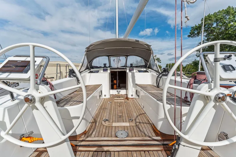 Rusalka Yacht Photos Pics Italia Yachts 13.98 (2015) sailboat cockpit with dual steering wheels and teak decking.