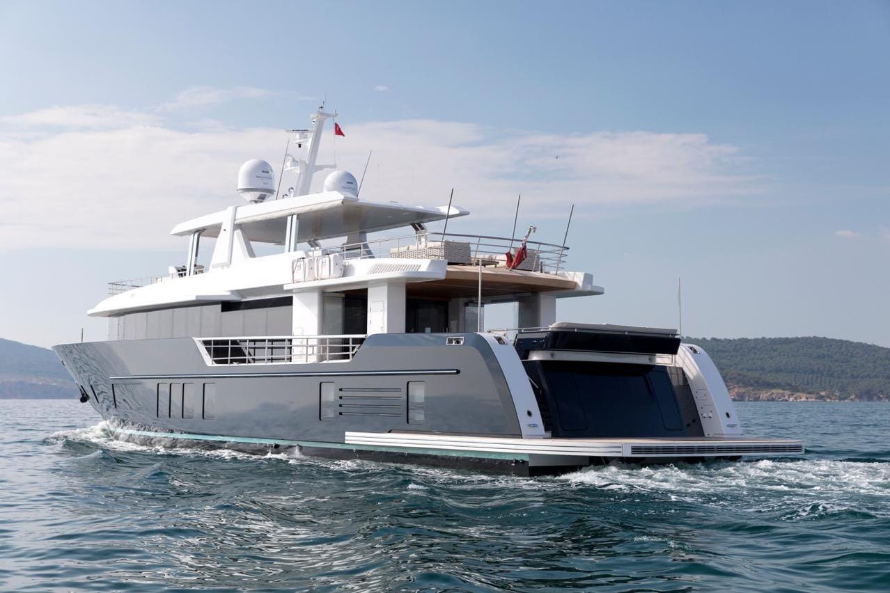 Luxury yacht Alpha Alfresco 125, 2020 model, cruising on open water.