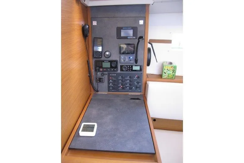 Naia Grey Yacht Photos Pics Control panel of 2022 Jeanneau Sun Odyssey 349 sailboat, featuring navigation and communication equipment.