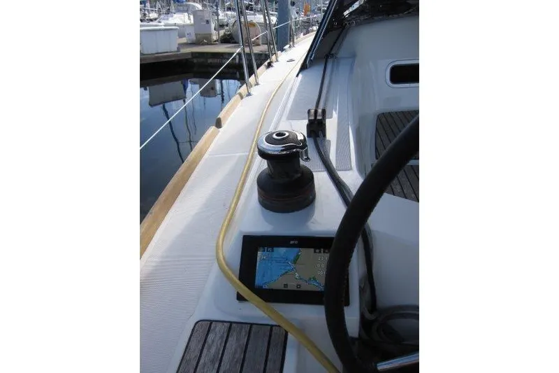 Naia Grey Yacht Photos Pics Jeanneau Sun Odyssey 349 sailboat deck with winch and navigation display, 2022 model.