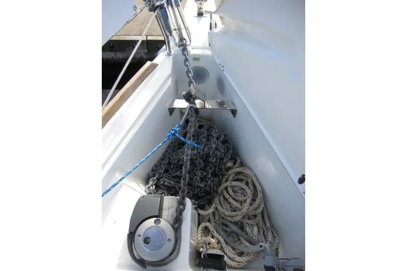 Naia Grey Yacht Photos Pics Anchor chain and ropes on Jeanneau Sun Odyssey 349, 2022 model sailboat deck.