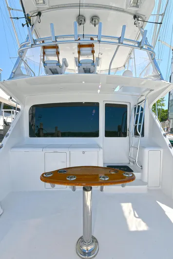 Salty Dog Yacht Photos Pics 2002 Viking 48 Convertible yacht with sleek deck and fishing station.