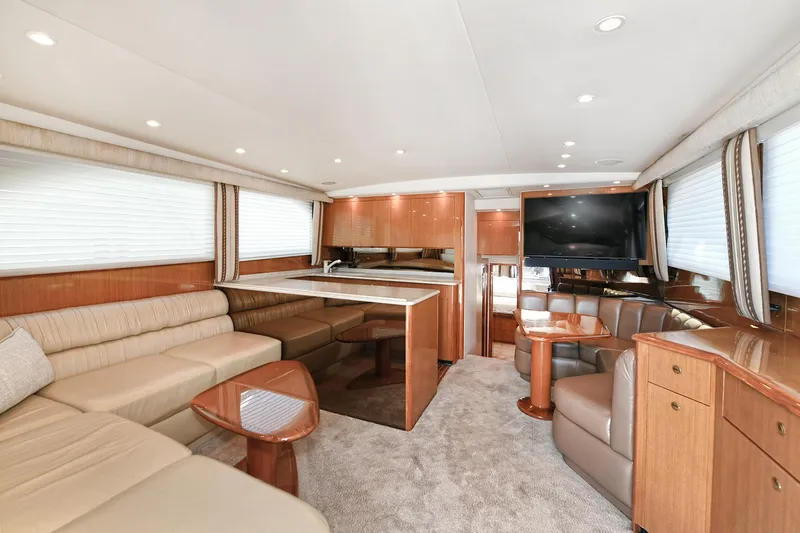 Salty Dog Yacht Photos Pics Luxurious interior of 2002 Viking 48 Convertible yacht with modern furnishings and spacious layout.