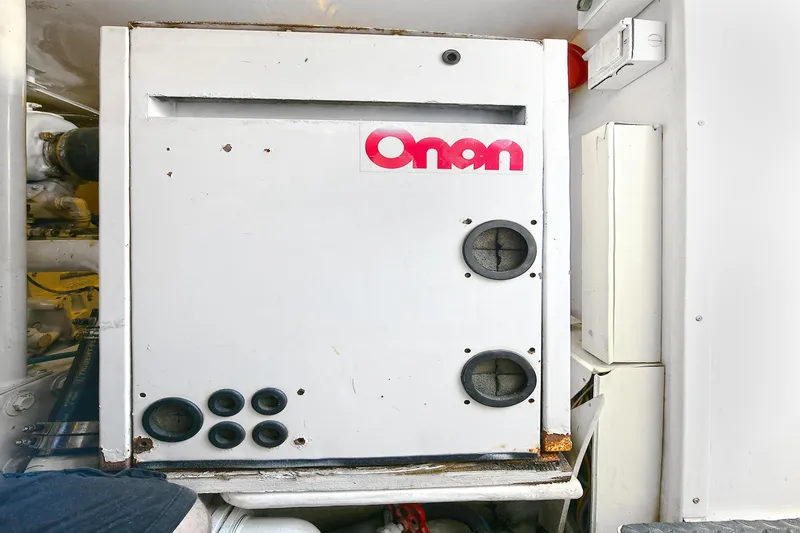 Salty Dog Yacht Photos Pics Onan generator in a 2002 Viking 48 Convertible yacht engine room.