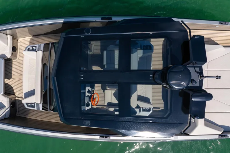  Yacht Photos Pics Overhead view of 2022 Vanquish VQ40 luxury boat on water.