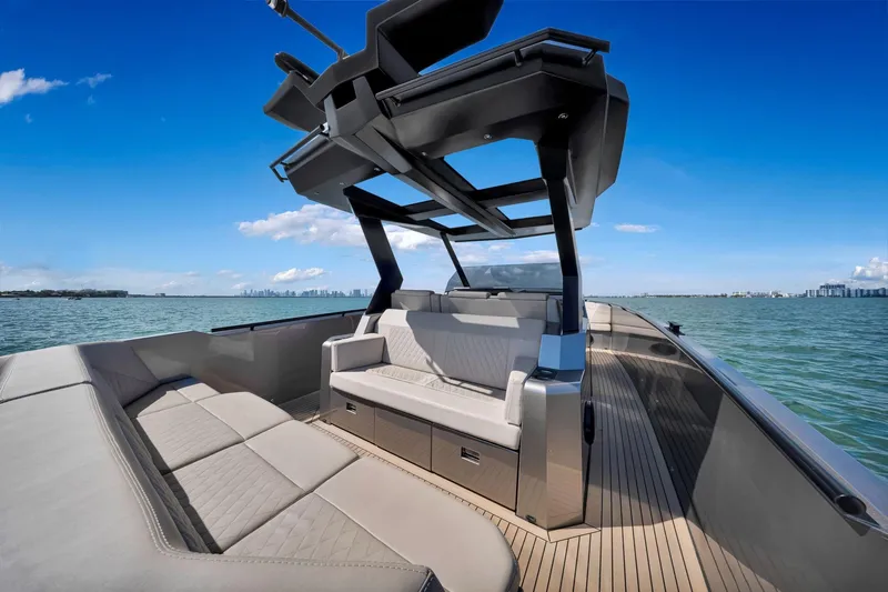  Yacht Photos Pics Luxurious 2022 Vanquish VQ40 yacht interior with sleek seating and modern design on open water.