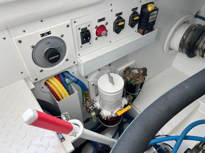  Yacht Photos Pics Engine control panel of 2025 Henriques 35 Express Hardtop boat, featuring switches and wiring.
