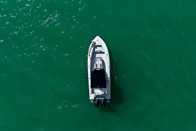  Yacht Photos Pics Aerial view of 2022 ShearWater 270 SS Carolina Open on green water.