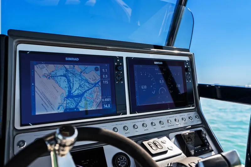  Yacht Photos Pics ShearWater 270 SS Carolina Open 2022 helm with Simrad displays.