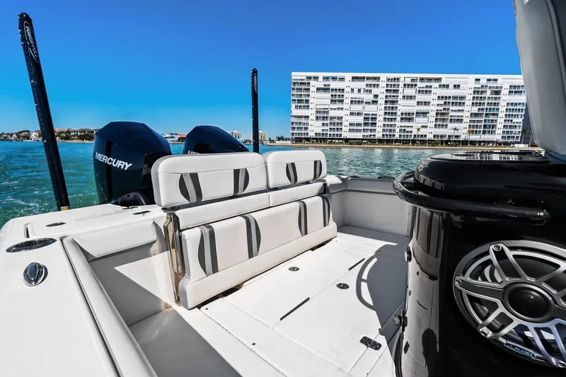  Yacht Photos Pics ShearWater 270 SS Carolina Open 2022 on water with buildings in background.