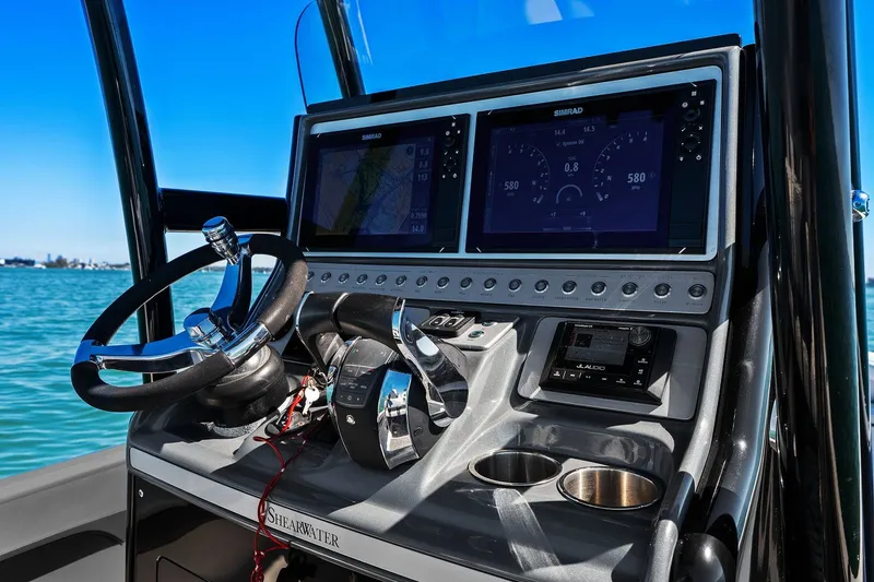  Yacht Photos Pics ShearWater 270 SS Carolina Open 2022 helm with Simrad displays.