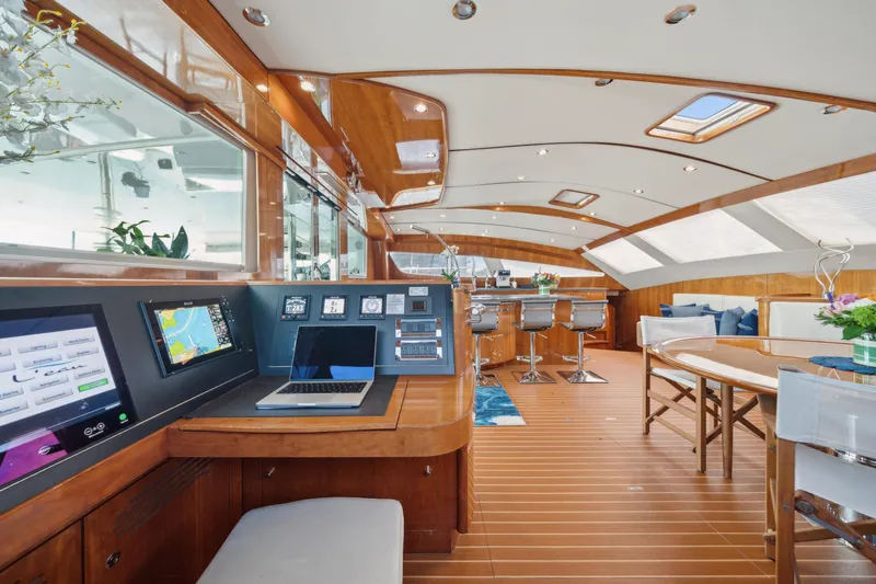 Sur L'eau Yacht Photos Pics Luxurious interior of 2008 Privilege 745 yacht with modern navigation and elegant seating.