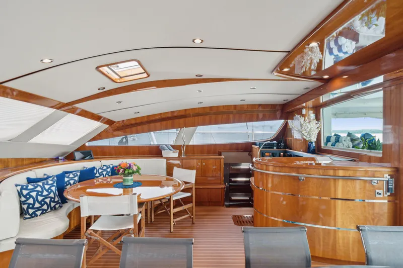 Sur L'eau Yacht Photos Pics Luxurious interior of 2008 Privilege 745 yacht with elegant wood finish and modern furnishings.